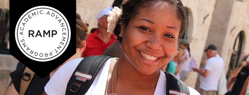 Smiling female carrying backpack