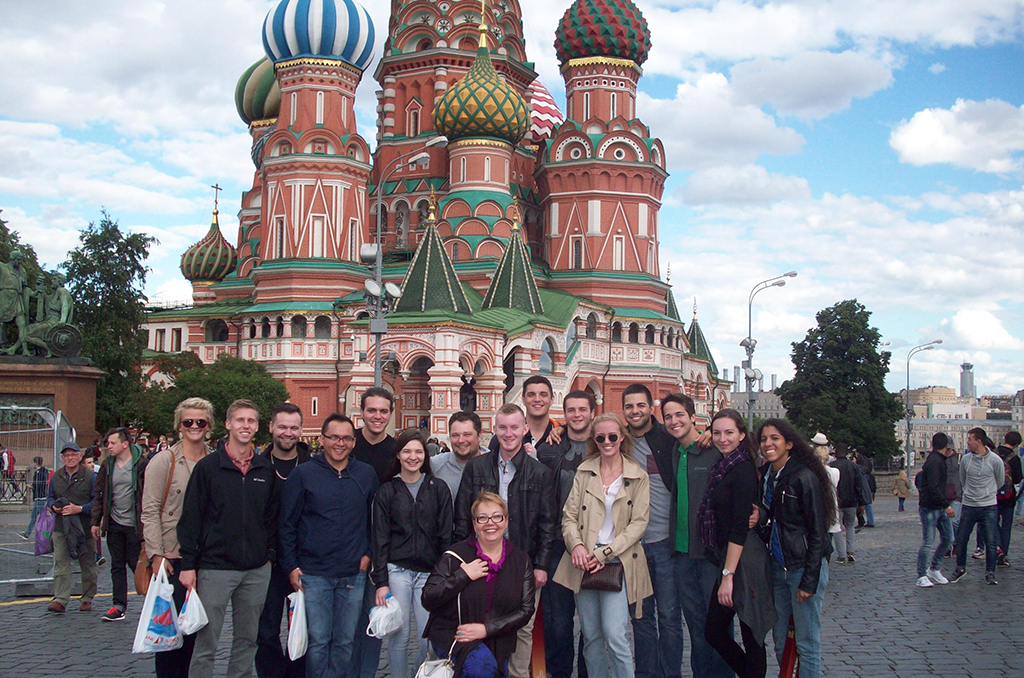 students in front of the Kremlin in Russia