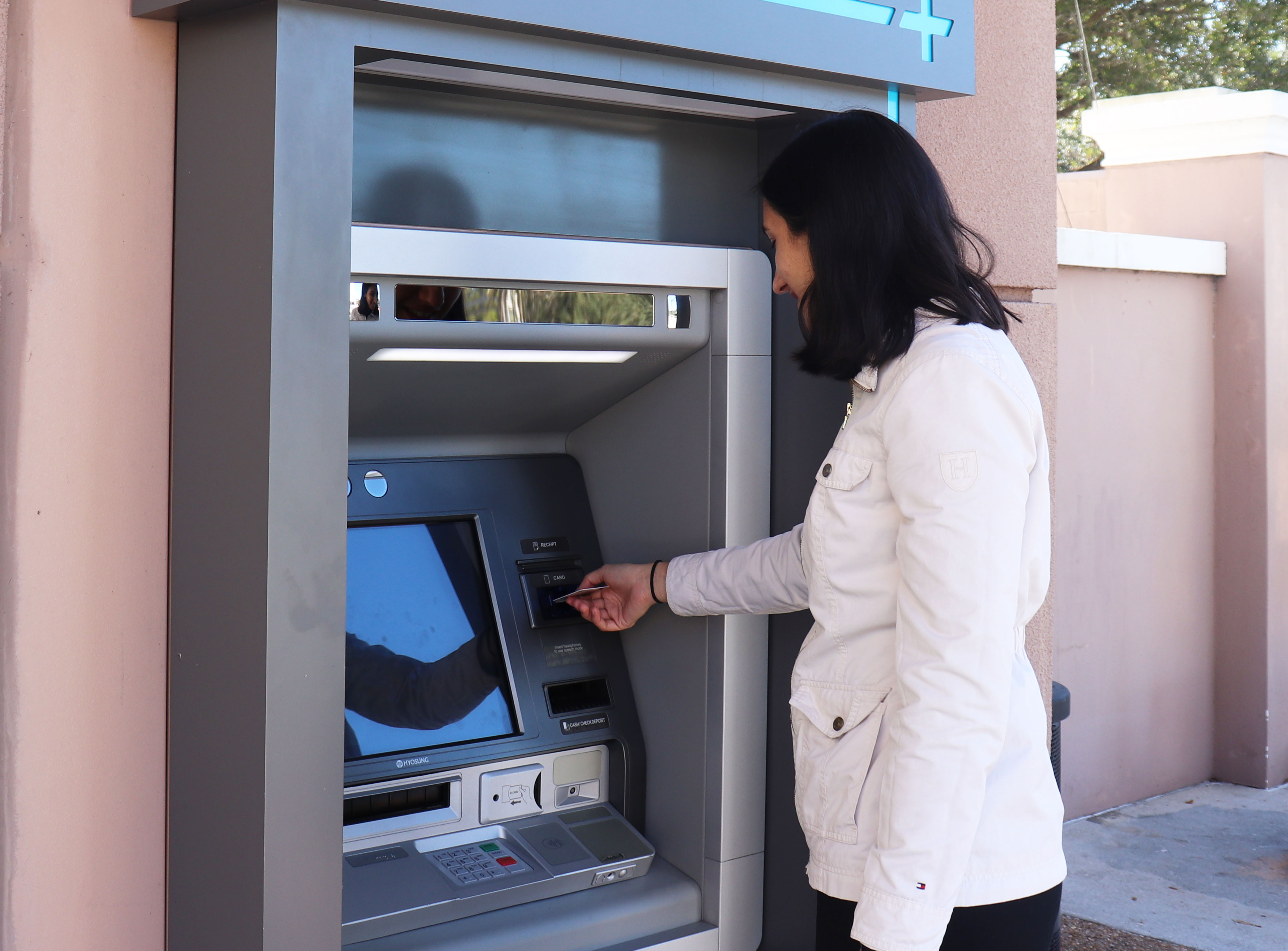 student using ATM
