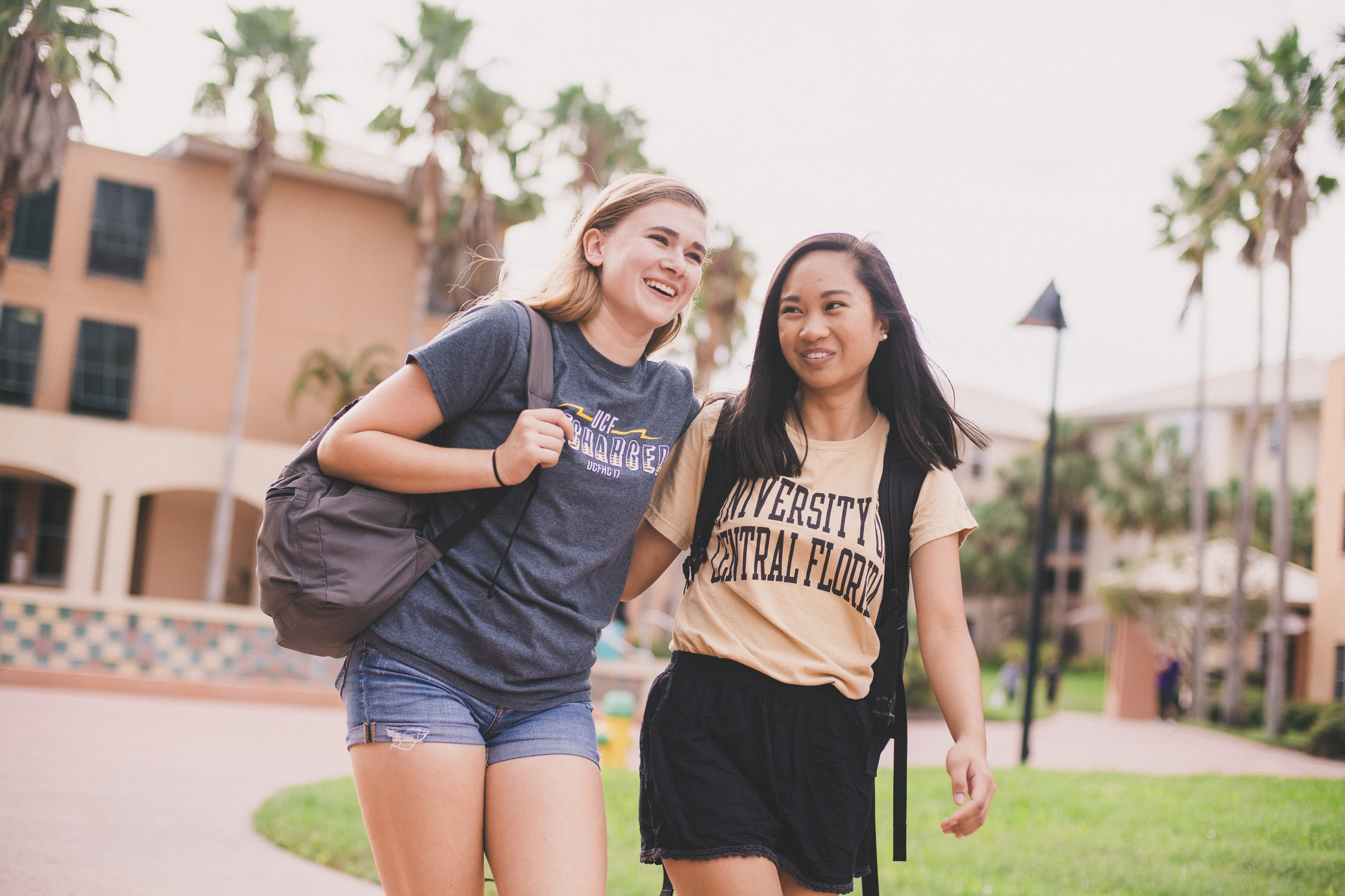 two female students walking on campus