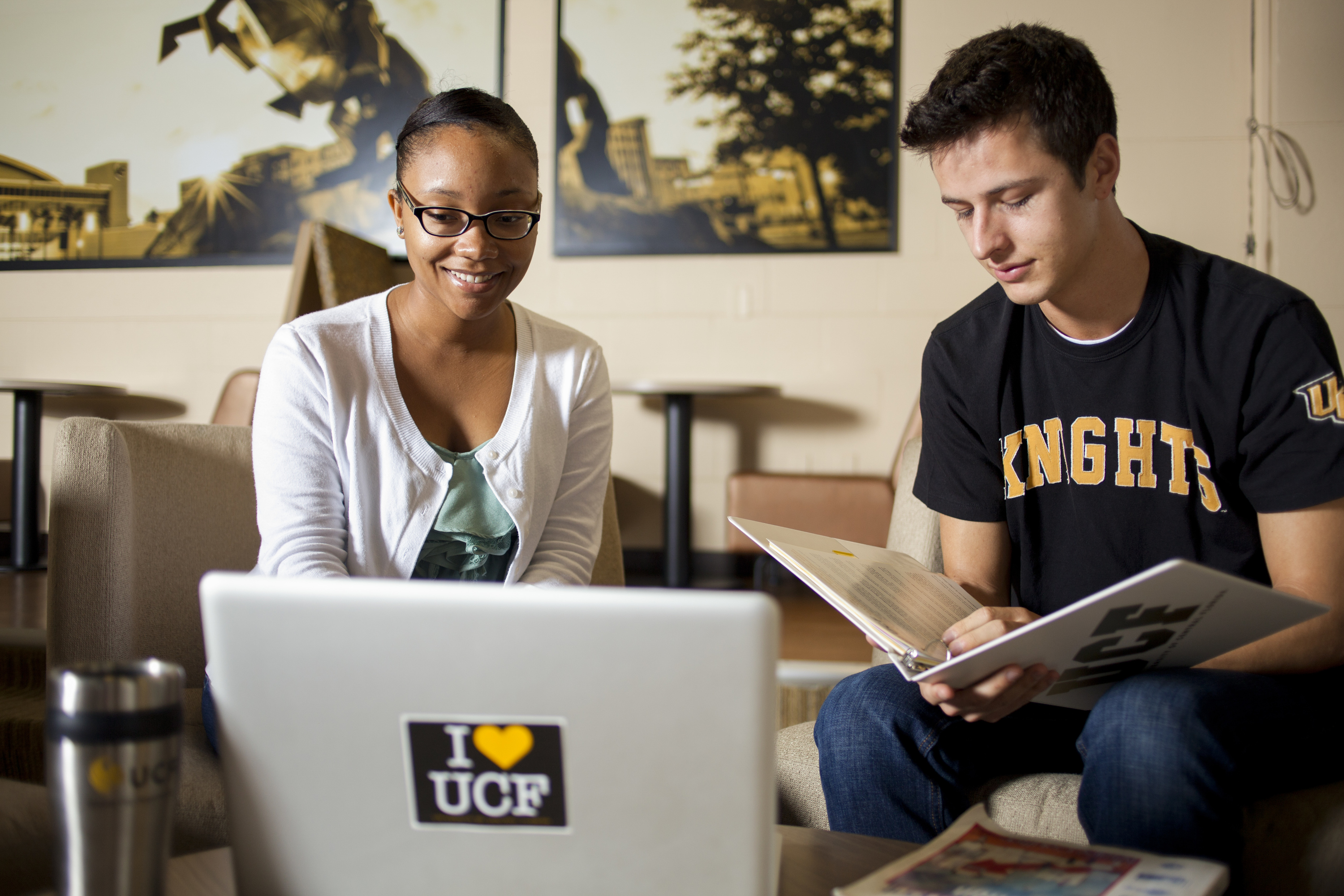 Two students talking in Farrell Commons