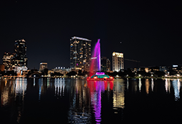 The Orlando Skyline from across the lake and Fountain