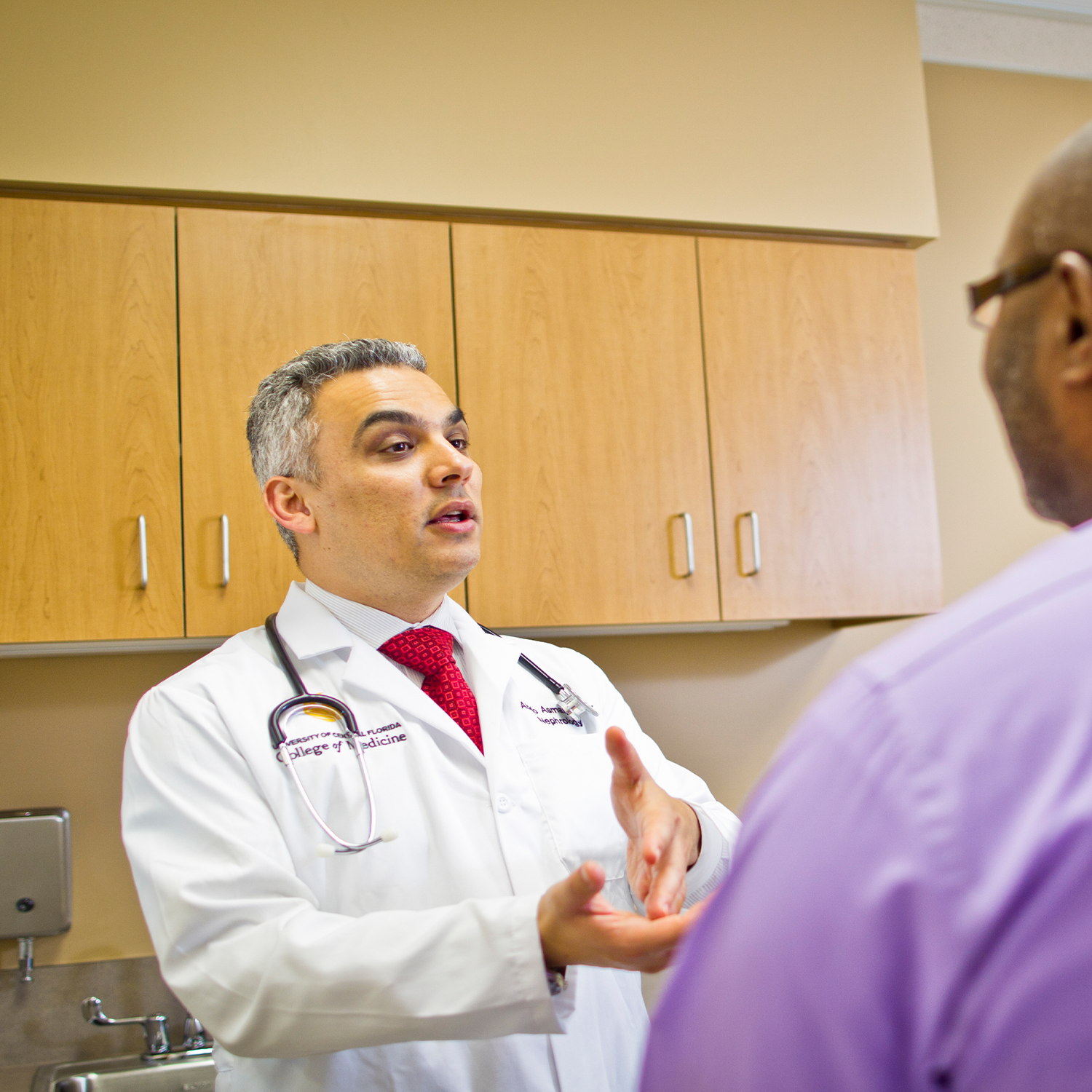 Doctor talking to patient